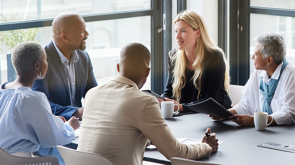 group of workers at conference table