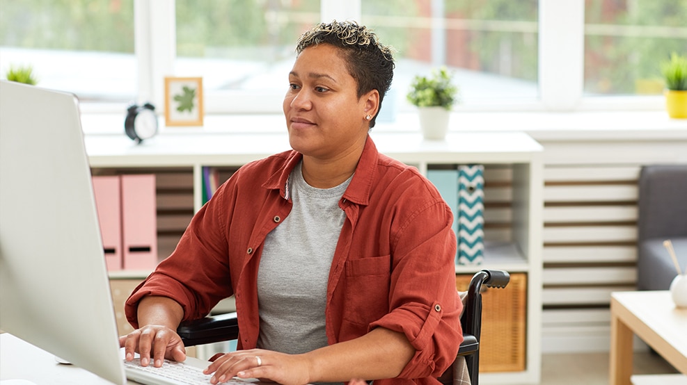 person at computer in a work setting